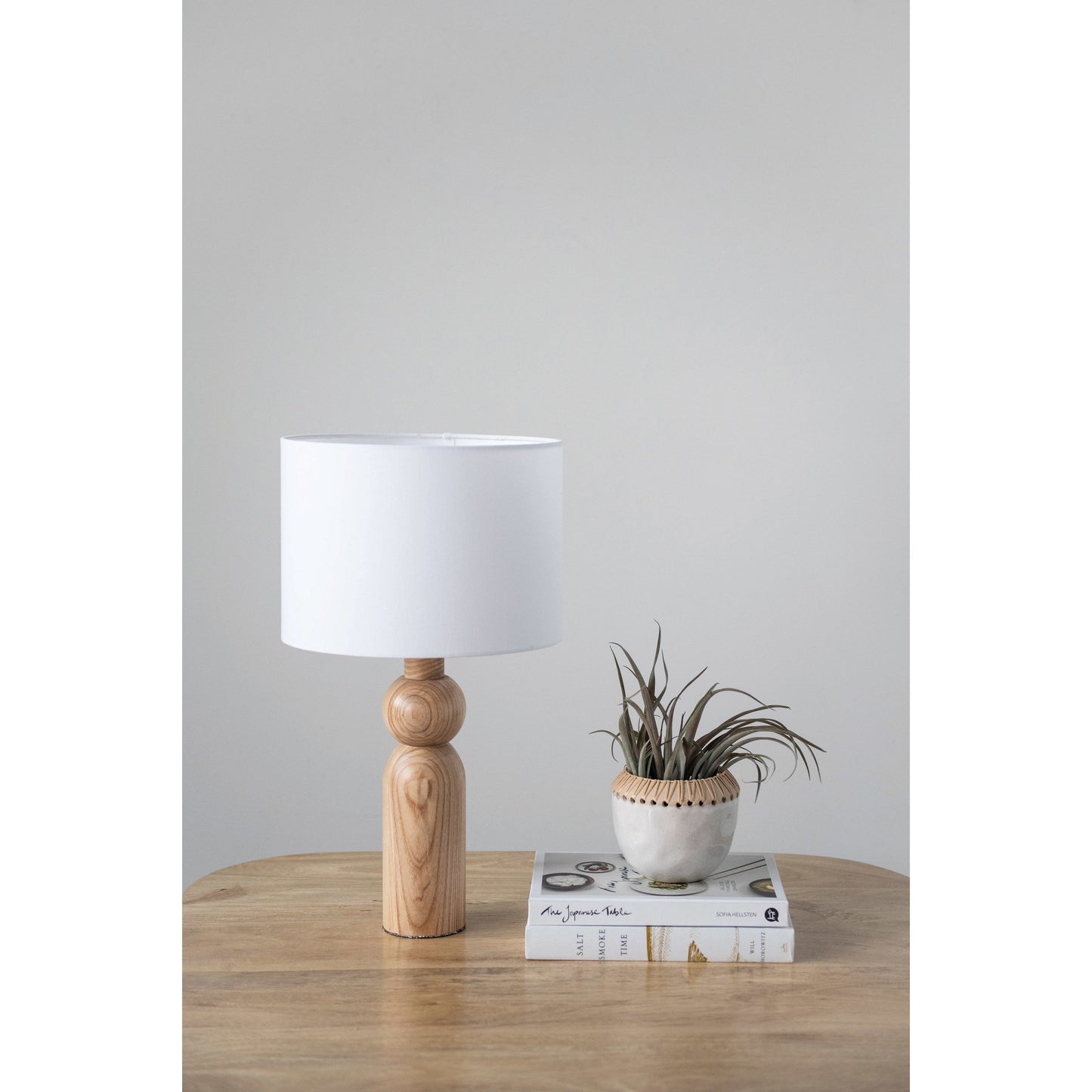 Natural Wood Table with Linen Shade Lamp